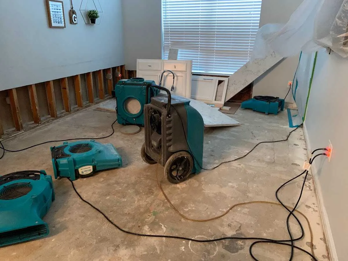 Dehumidifier in flood-cut room for Water Damage Restoration in Gloucester