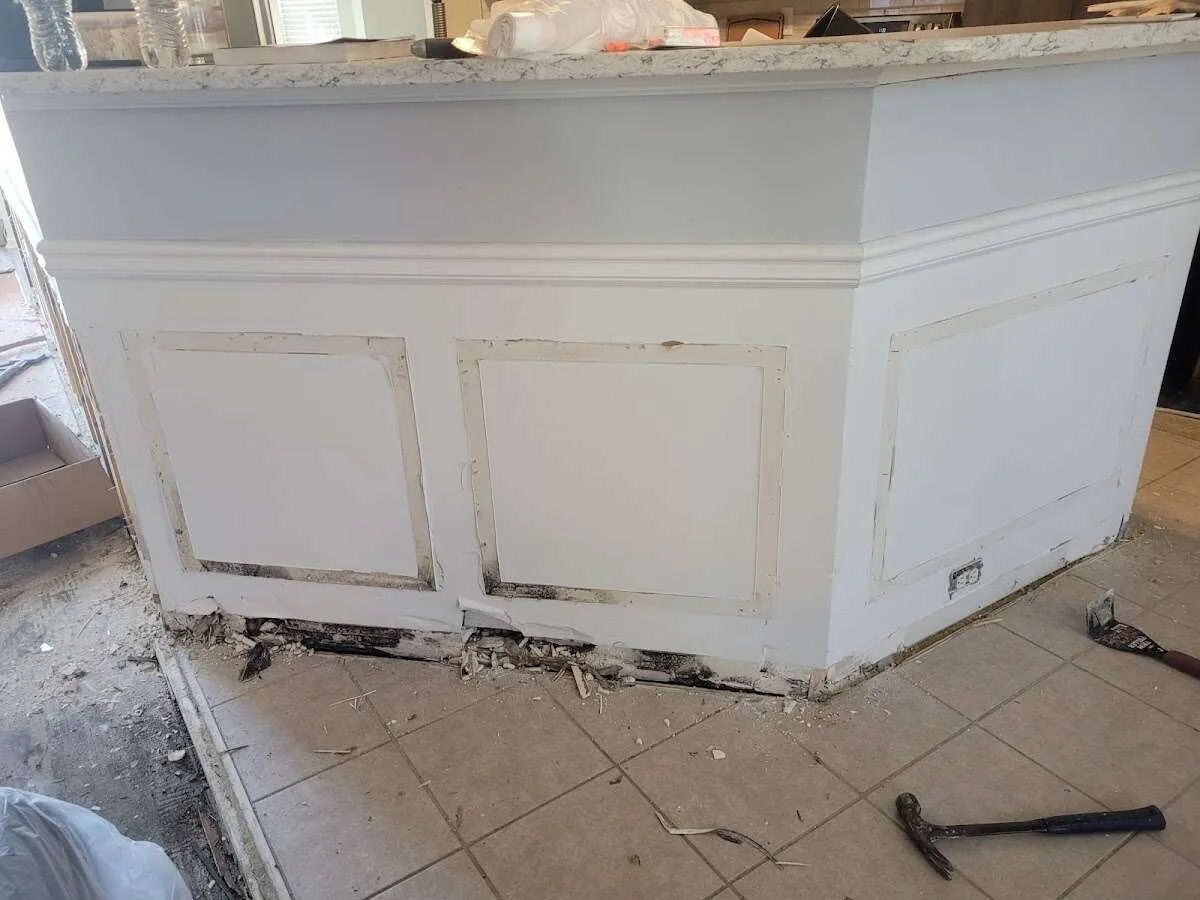Water damage and mold on kitchen during Storm Damage Restoration in Gloucester